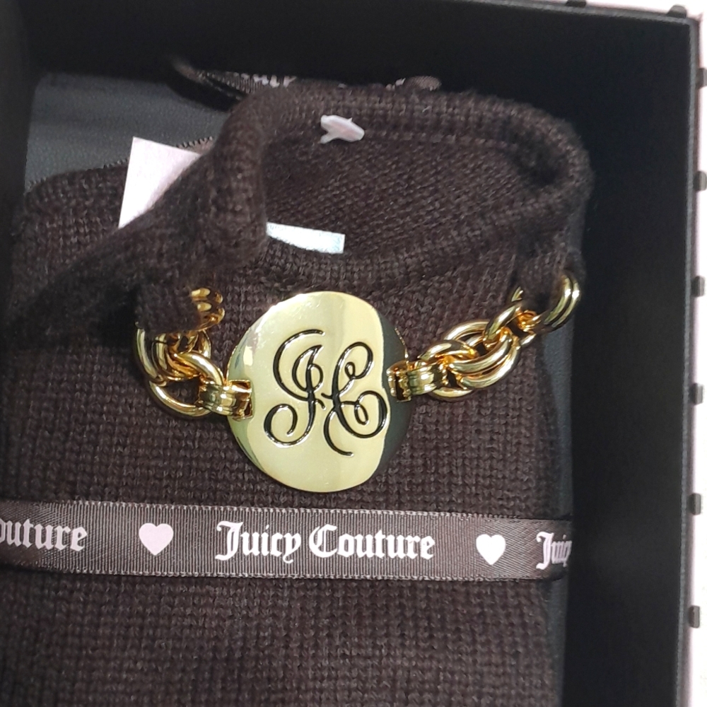 Juicy Couture chocolate brown knit gloves with medallion cuff.  Gift boxed